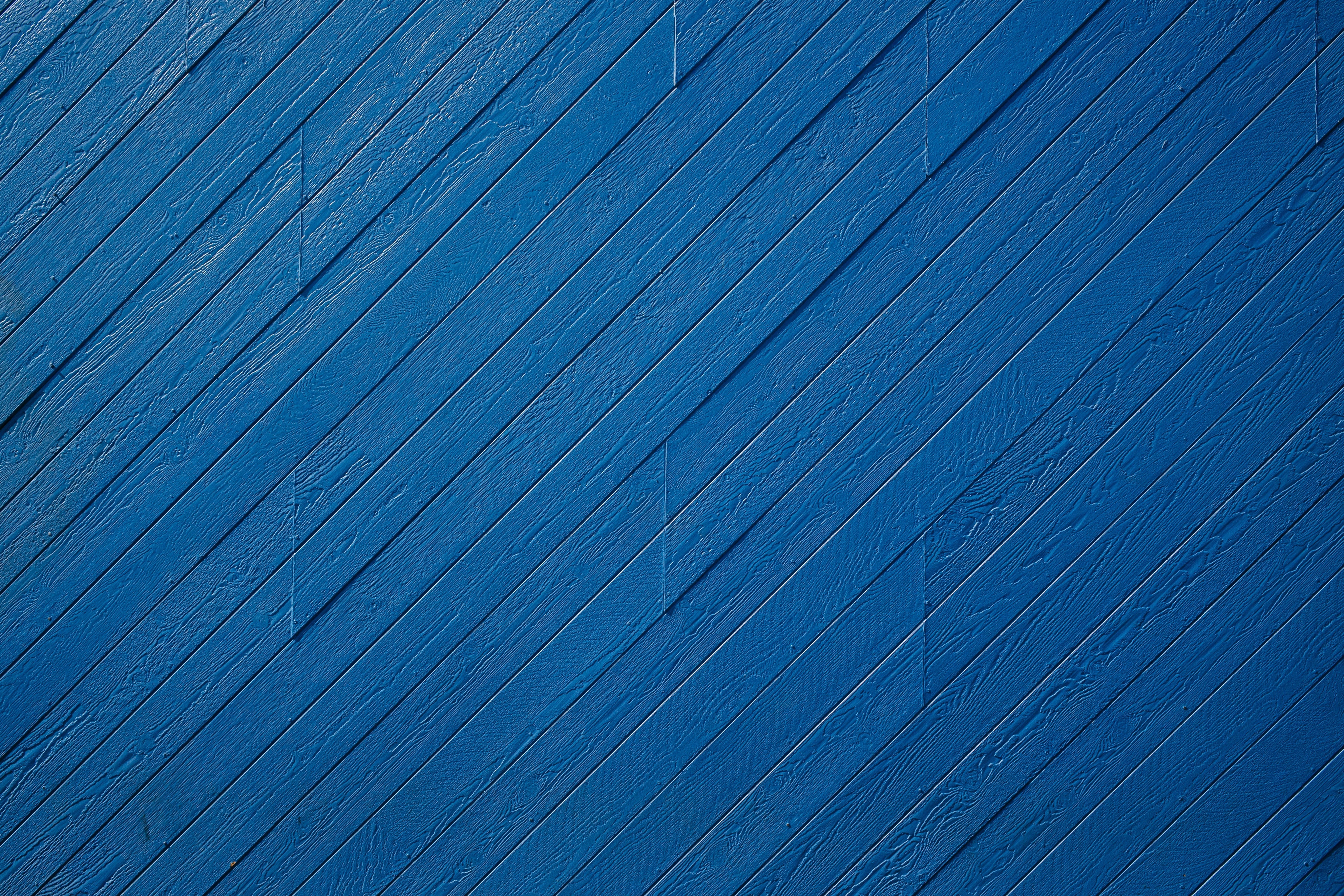 Texture of wood cladding painted blue